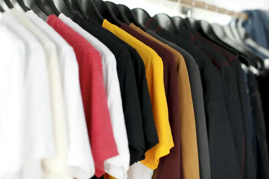A rail of colourful clothes in a shop